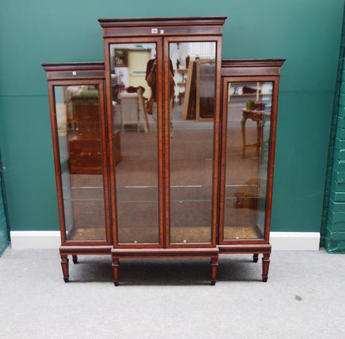 S & H Jewell; a Victorian inlaid rosewood glazed four door display cabinet, on tapering square supports, with brass maker's plaque "S & H Jewell 29,30