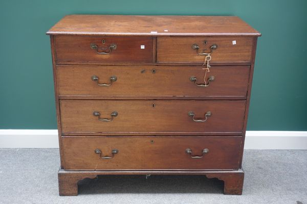 A George III mahogany chest of two short and three long graduated drawers, on bracket feet, 111cm wide.