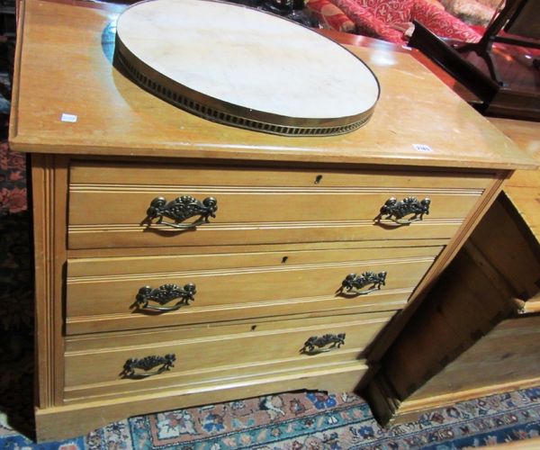 A Victorian inlaid walnut Canterbury whatnot with pierced gallery, on turned supports, over single drawer base, 53cm wide.