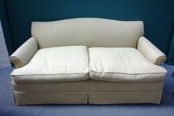 A 20th century green upholstered sofa, with scroll over arms, 175cm wide.