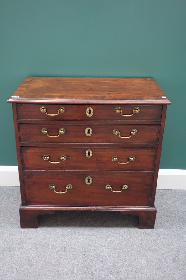 A mid-18th century crossbanded mahogany chest with four long graduated drawers on bracket framed feet, 74cm wide.