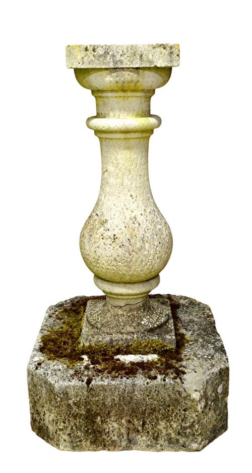 An early 20th century Georgian design baluster shaped carved Portland Stone sundial column, on canted square base, 115cm high. Illustrated