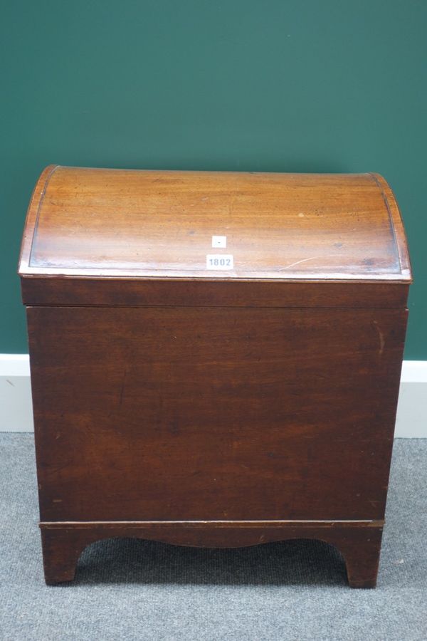 A George III mahogany domed topped wine cooler, on bracket feet, 47cm wide.