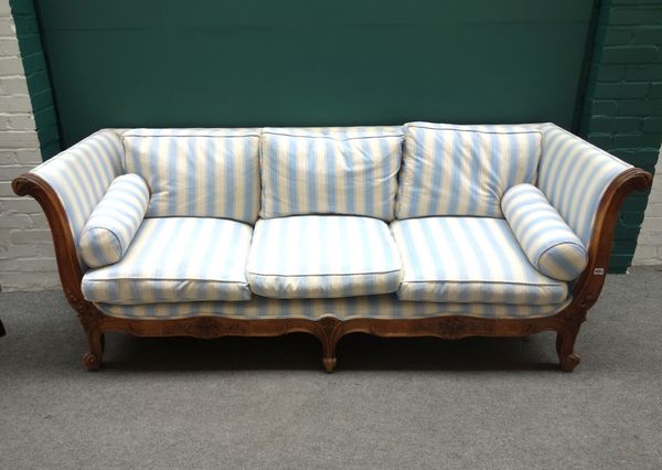 A 19th century French walnut framed square back sofa, with floral chased frame, on scroll supports, 220cm wide.