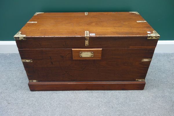 A 19th century metal bound rectangular teak trunk, on plinth base, 90cm wide.