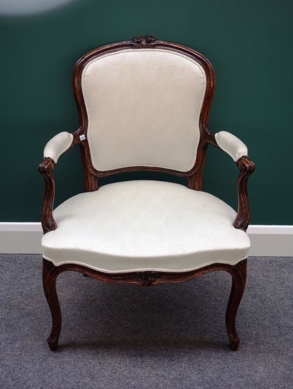 A 18th century faux rosewood open armchair, with serpentine seat on cabriole supports.