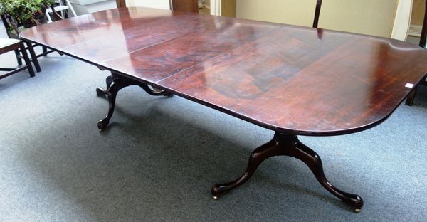 William Tillman; an 18th century style mahogany 'D' end extending dining table, to include two extra leaves, each pedestal with three downswept legs,