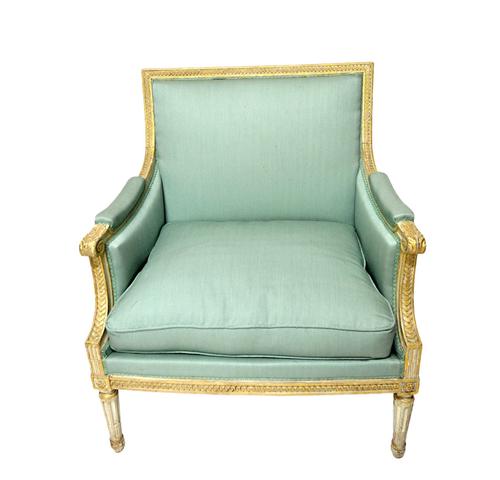In the manner of George Jacob; a large Louis XVI style square back fauteuil, with semi-padded arms and straight seat, on tapering fluted supports. Ill