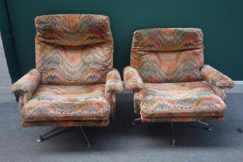 Howard Keith a 20th century three piece suite, comprising; a sofa, 175cm wide, and a pair of armchairs, all with open arms and five point chrome bases