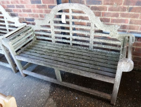 A 20th century hardwood garden bench of Lutyens design, 166cm wide.