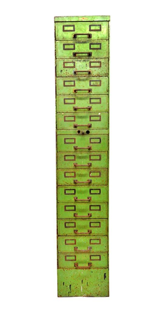 An 20th century green painted sheet metal bank cabinet of fourteen drawers, with 'R.N.E' label to top, 36cm wide x 187cm high. Illustrated