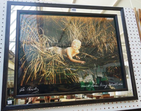 A group of three photographic prints of Marilyn Monroe, indistinctly signed and inscribed. (3)