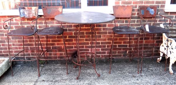 An early 20th century French wood and wrought iron circular tall café table, 98cm wide, together with two pairs of high chairs, (5).