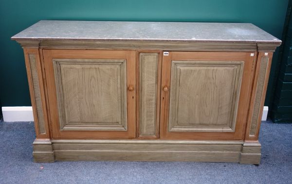 A 20th century Italian design side cabinet, the rectangular marble top over a pair of panel cupboards, on plinth base, 167cm wide.