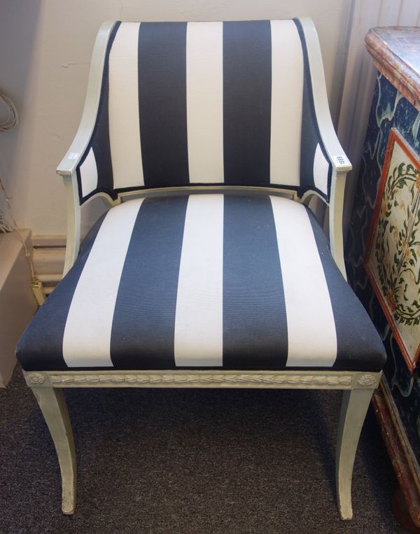 A pair of grey painted early 19th century style side chairs, with striped upholstery on sabre supports, stamped 'CIWS', (2).