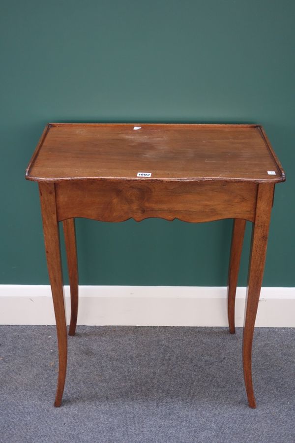 A 19th century Italian walnut side table, the shaped top with end frieze drawer, on splayed supports, 60cm wide.