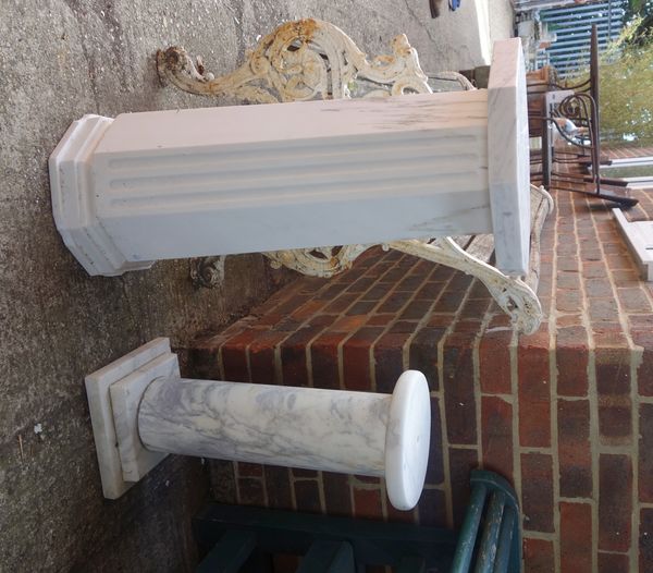 A 20th century white marble pedestal, with fluted octagonal column 78cm high, together with a similar turned column, 61cm high. (2).