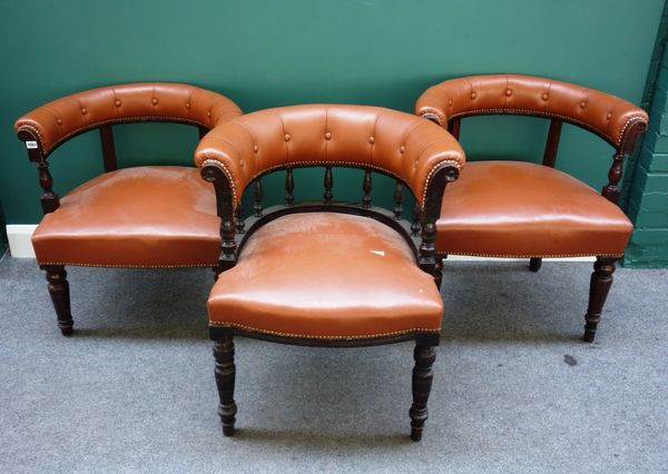 A matched set of three Victorian framed tub back chairs on square supports. (3)