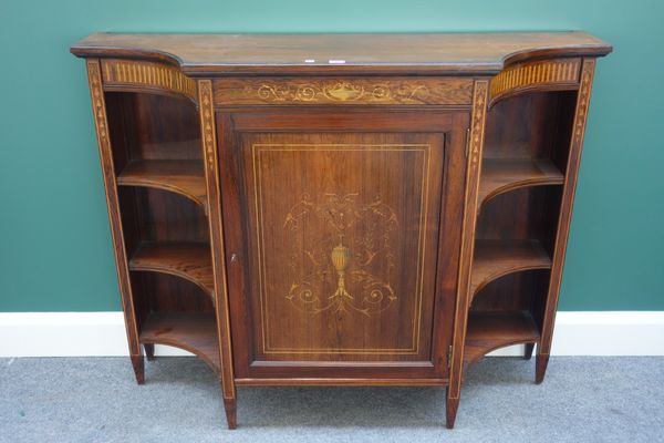 A late 19th century marquetry inlaid rosewood side cabinet with panelled central door, flanked by swept back open shelves, on tapering square supports