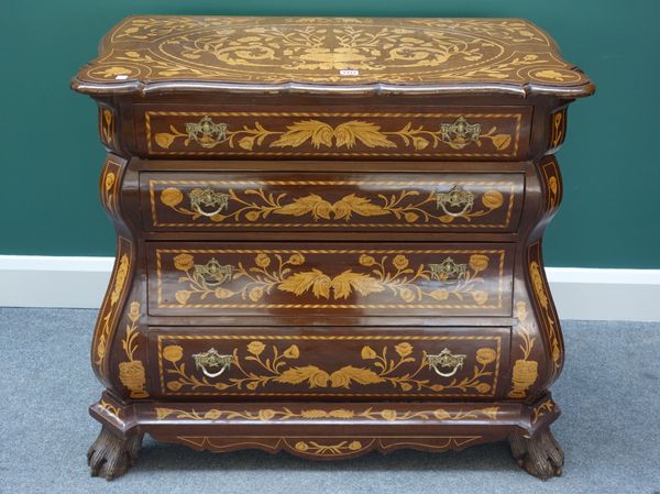 An 18th century Dutch style marquetry inlaid walnut bombe commode of four long drawers, on lions paw feet, 92cm wide.