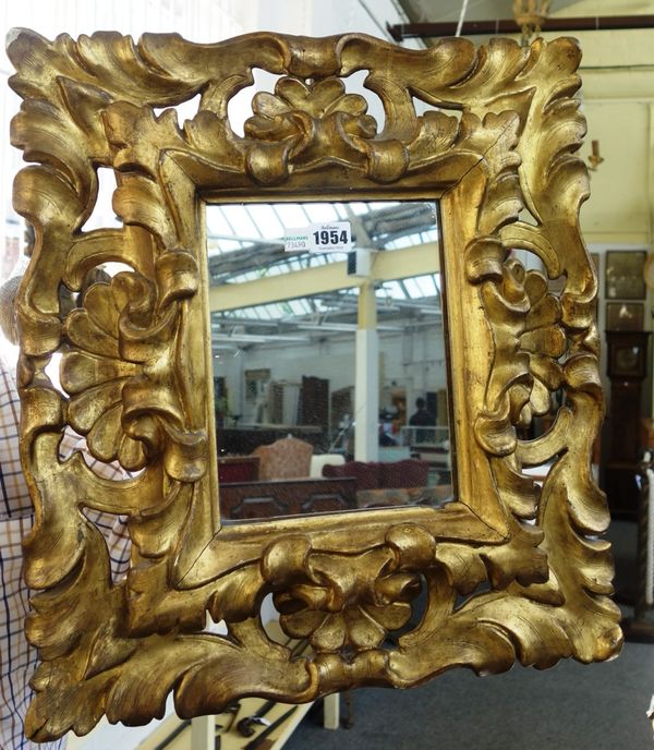 A 19th century Italian deep carved gilt framed wall mirror with pierced decoration, 45cm wide x 50cm high.