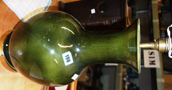A 20th century green glaze ceramic table lamp.