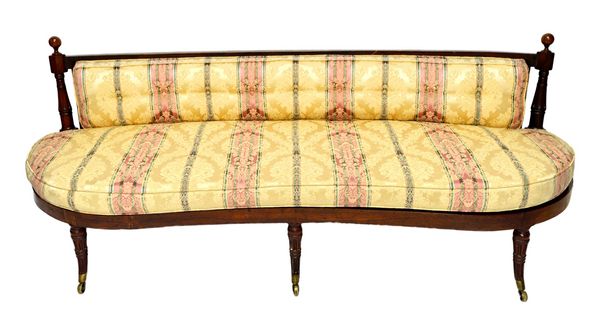 An early 19th century rosewood framed kidney shaped sofa, on splayed and turned fluted supports, 195cm wide. Illustrated