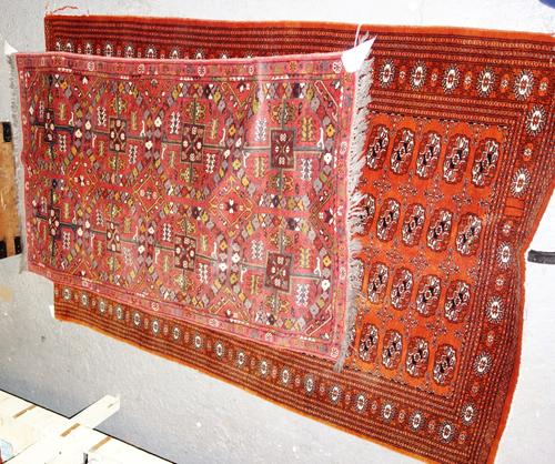 A Pakistan Bokhara rug, 188cm x 130cm and an Afghan rug, 146cm x 94cm, (2).