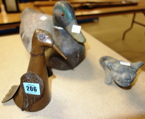 An embossed copper model of a bird, a pottery cat and a modern decoy duck, (3)