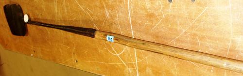 An 18th century and later iron bread paddle.