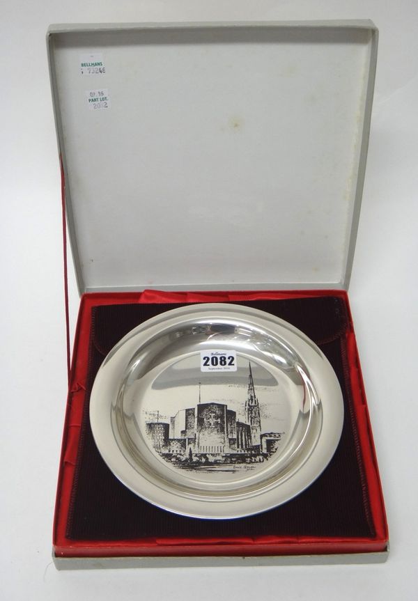 A silver circular dish commemorating the tenth anniversary of the consecration of the new Cathedral at Coventry, with the original box, by John Pinche