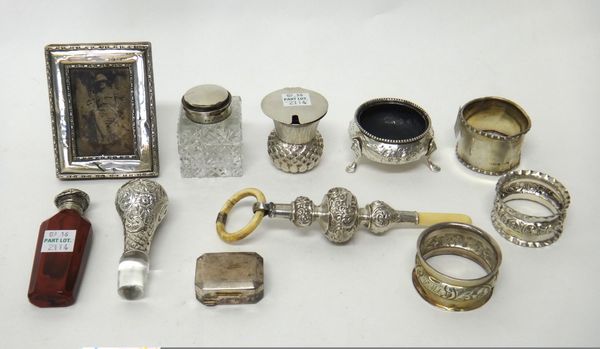 Silver and silver mounted wares, comprising; a Scottish mustard pot formed as a thistle, Edinburgh 1907, a baby's teether Birmingham 1901, three napki