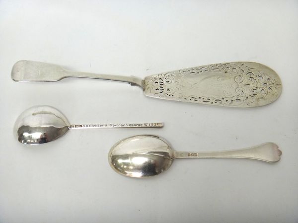 Silver, comprising; a copy of a slip top spoon, detailed Mercers Company, George VI 1937, London 1937, a rat tail trefid end spoon, London 1903 and a