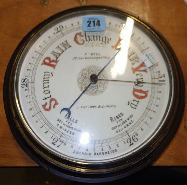 A circular aneroid barometer and a silver topped walking stick, (2).