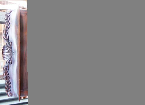 A gold ring, claw set with a piece of natural amethyst crystal, the twin shank with a partly textured design, ring size M, with a case.