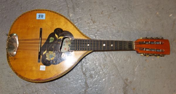 A mandolin with fruitwood inlay.