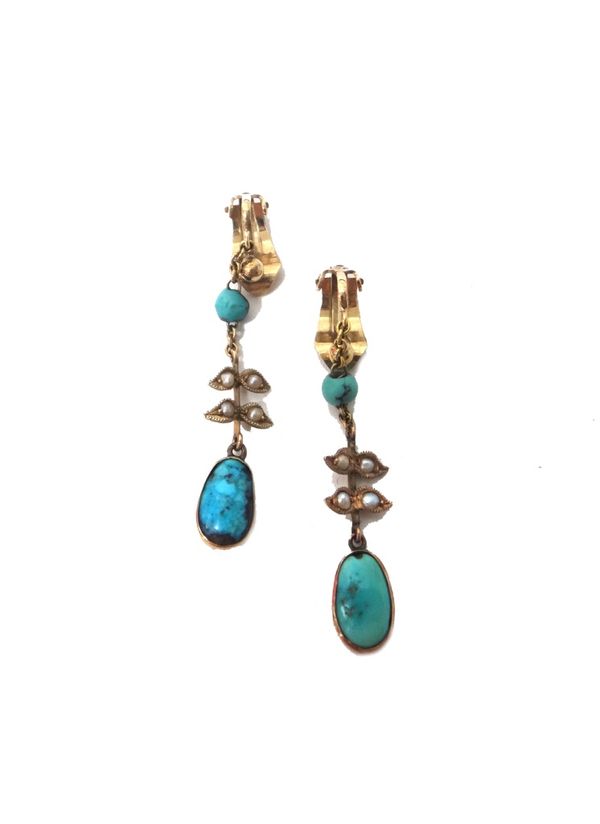 A pair of turquoise and seed pearl pendant earrings, each with the principal oval turquoise to the drop and with seed pearl set foliate divisions and