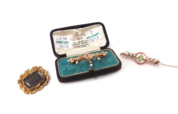 A gold and seed pearl set bar brooch, with a trefoil motif and with three seed pearl drops to the front, with a case, a gold, peridot and seed pearl s