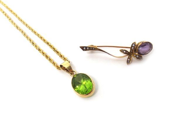 A gold, amethyst and seed pearl set brooch, designed as a flower spray, detailed 9 C and a peridot set single stone pendant, with a 9ct gold ropetwist