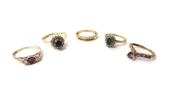 An 18ct gold, sapphire and diamond set cluster ring, a 9ct gold, ruby and diamond set three stone ring, a 9ct gold and diamond set half hoop ring, mou