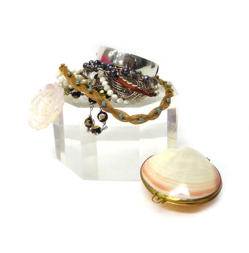 A silver oval hinged bangle and further silver and costume jewellery, comprising; six pairs of earrings, two rings, four pendants and lockets, an amet