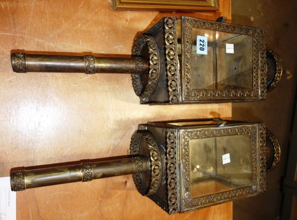 A pair of pierced brass coaching lamps, 56cm. (2)