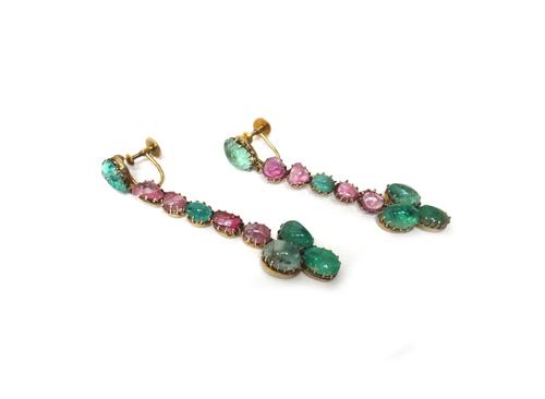 A pair of cabochon emerald, cabochon ruby and gem set earrings, the tops having screw fittings.