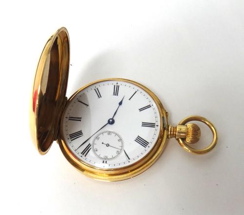 A gentleman's gold cased keyless wind hunting cased pocket watch, with an unsigned gilt jewelled lever movement, the enamelled dial with black Roman n