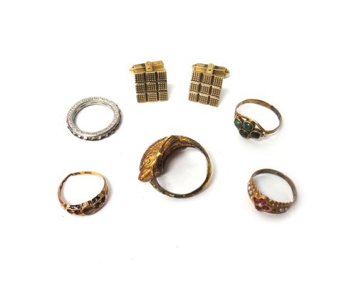 A pair of 9ct gold cufflinks, each with a square hatched nine section front and with a folding bar fitting at the back, by Kutchinsky, gross weight 11