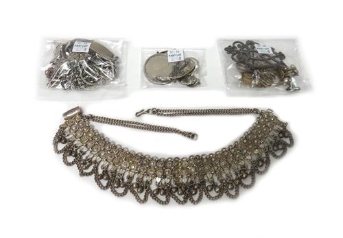 Mostly silver jewellery, comprising; a charm bracelet, an identity bracelet, two further bracelets, three neckchains, an Eastern collar necklace, four