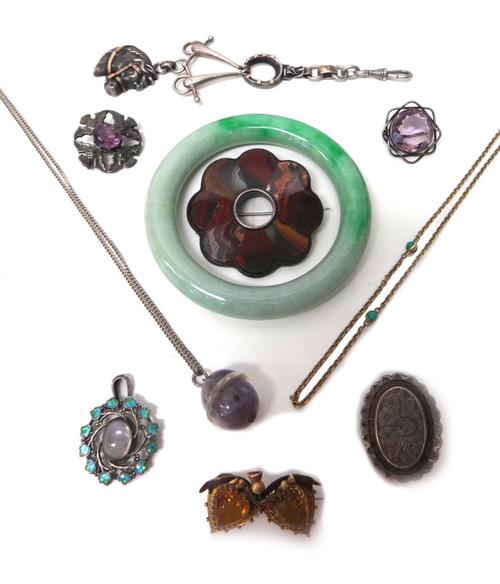 A moonstone set and blue/green enamelled pendant, in an Art Nouveau design, an amethyst quartz pendant with a neckchain, a turquoise set neckchain, a
