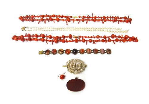 Two single row necklaces, of coral beads and branch corals, one coral earring, a single row necklace of graduated cultured pearls, a seed pearl brooch