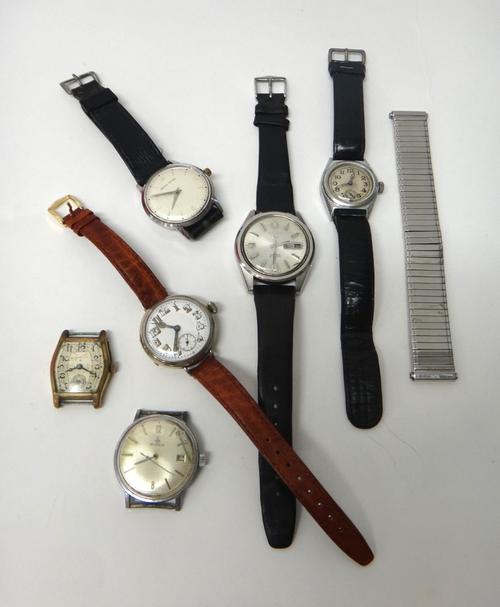 A gilt metal curved rectangular cased Rolco wristwatch, with a signed jewelled movement, a steel backed and chrome plated metal fronted Everite wristw