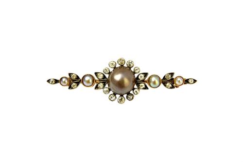 A diamond and cultured pearl brooch, mounted with the principal grey tinted cultured pearl at the centre, within a surround of cushion shaped diamonds